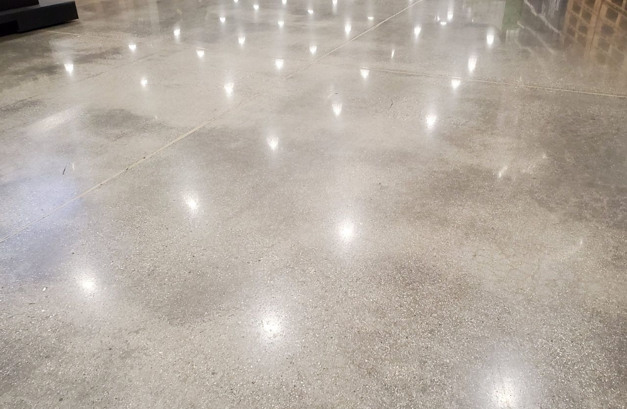 Polished concrete flooring in a commercial environment, ideal for modern and durable flooring
