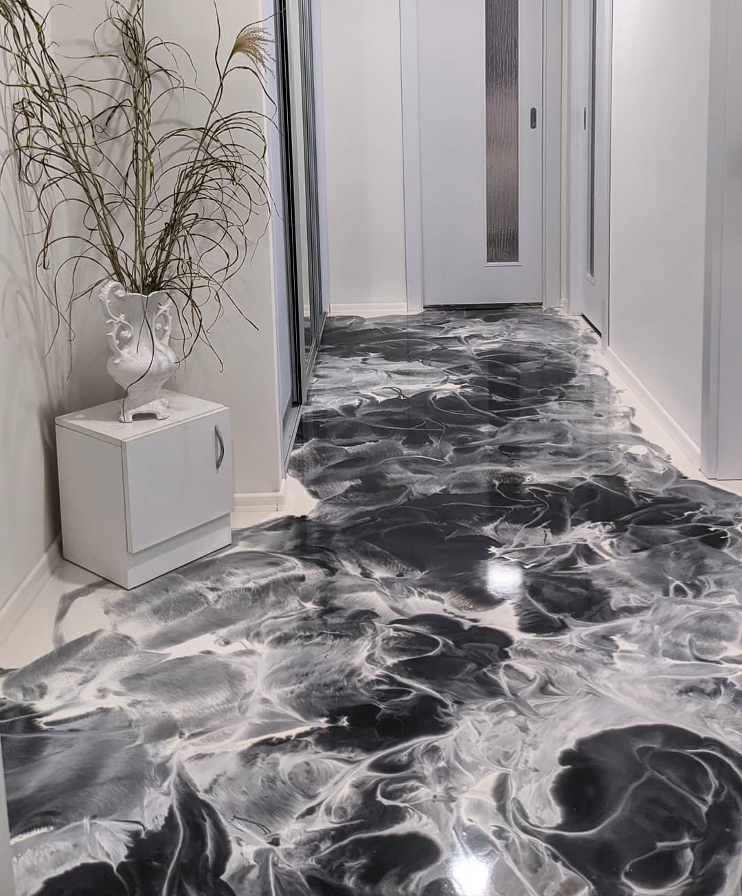 Metallic epoxy flooring with unique metallic sheen and modern aesthetic