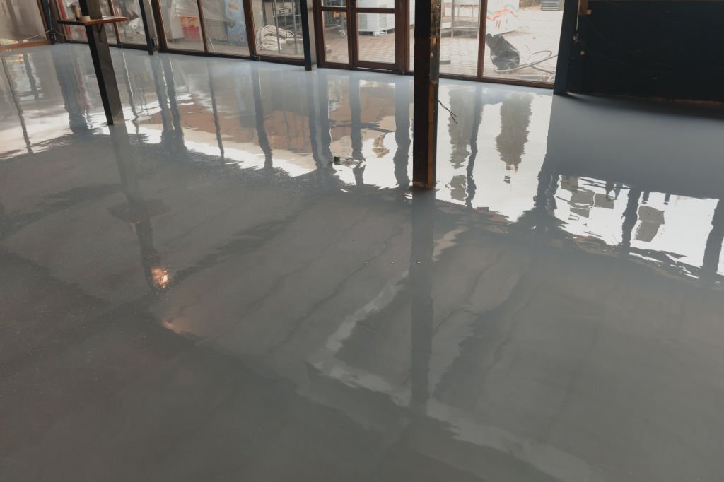 High-gloss epoxy flooring with smooth and reflective surface