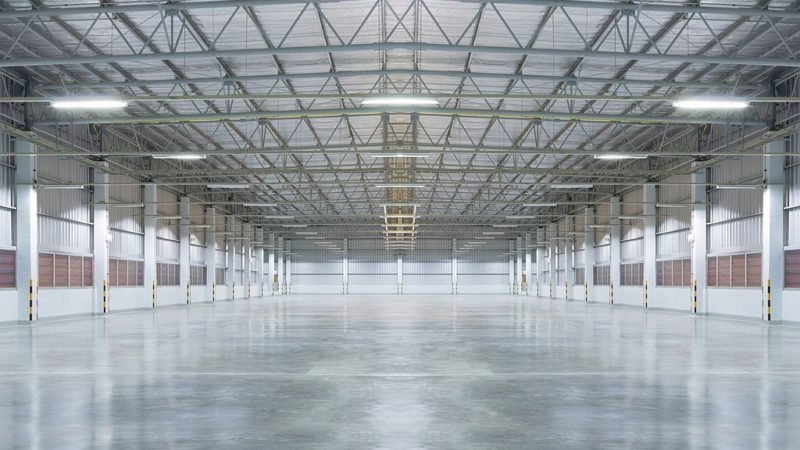 Decorative elements incorporated with polished concrete flooring for unique and visually appealing designs