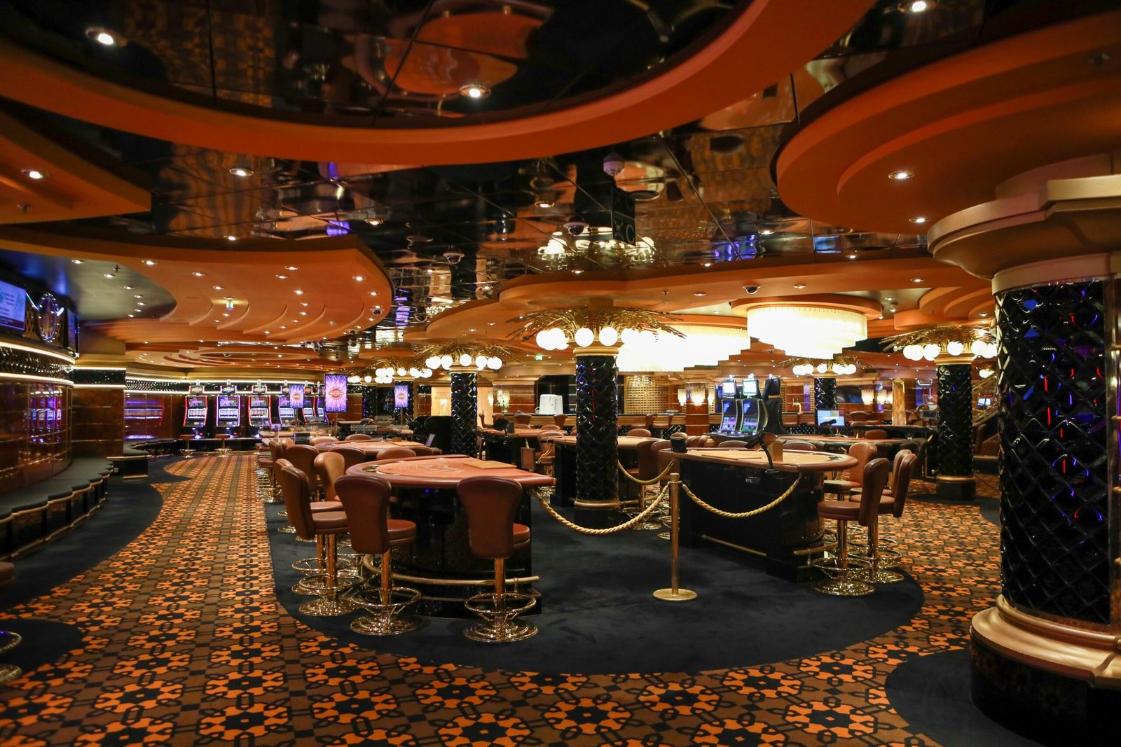 Casino gaming floor with seamless decorative epoxy finish under slot machines