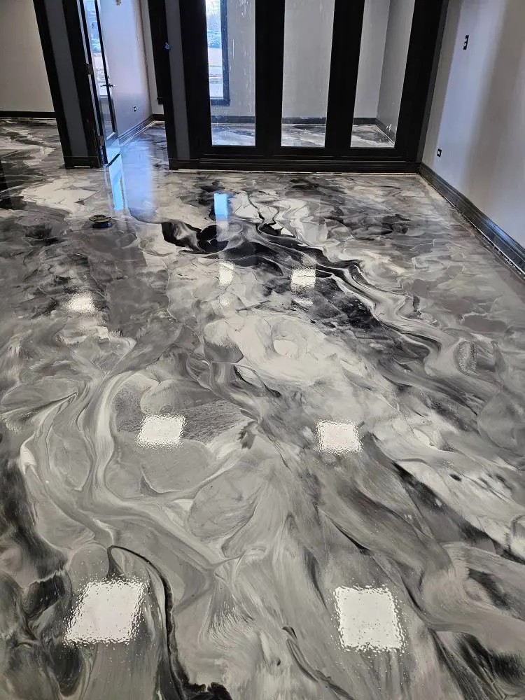 Black and white marble-style metallic epoxy floor in Vancouver BC