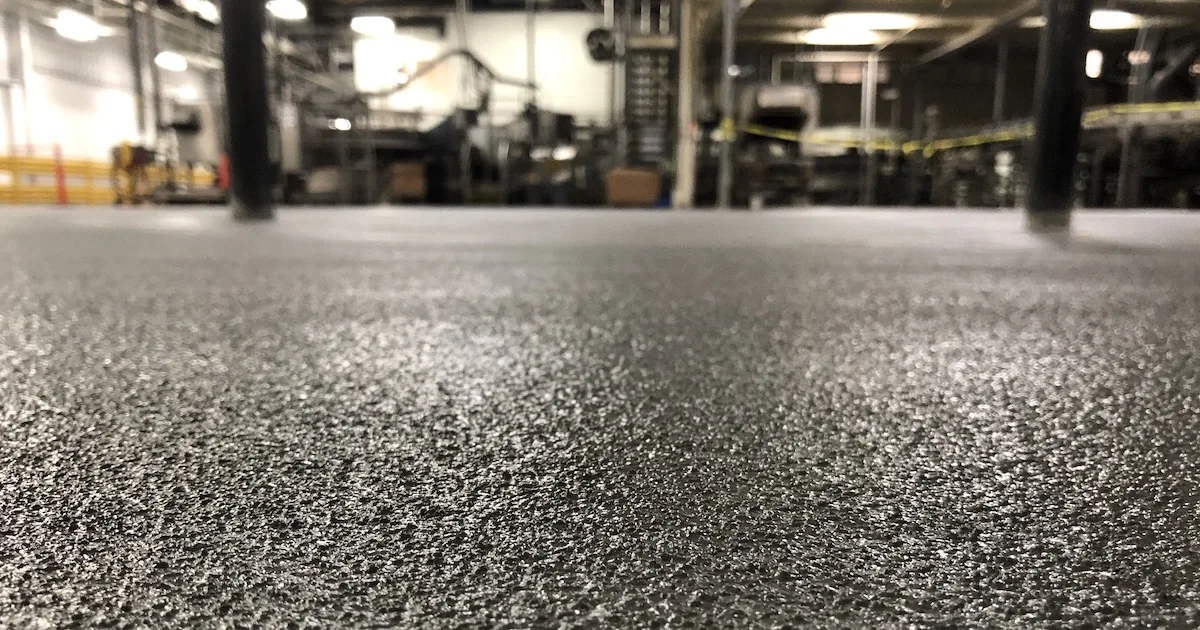 Finished polyaspartic floor coating in a Vancouver garage with a premium grey surface