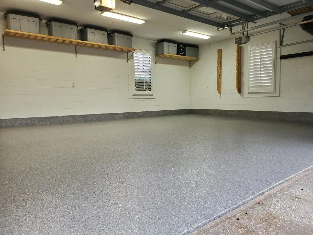 Polyaspartic floor coating installed in a clean residential garage in Vancouver BC