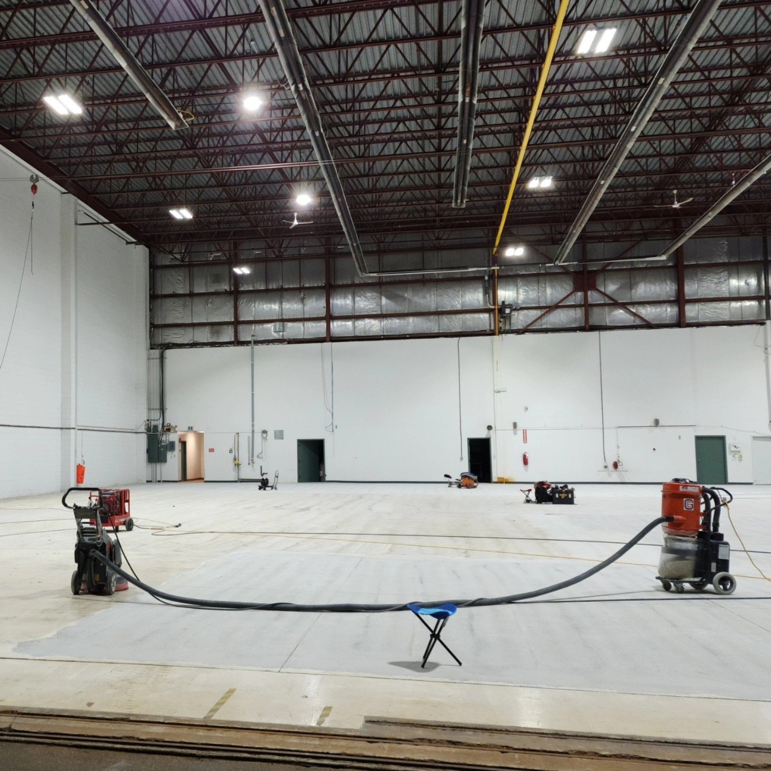 Mechanical surface preparation for aircraft hangar epoxy flooring