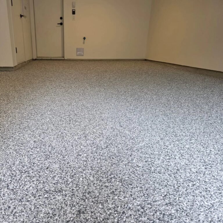 Decorative flake garage floor completed by Priority One Epoxy Flooring in Squamish BC