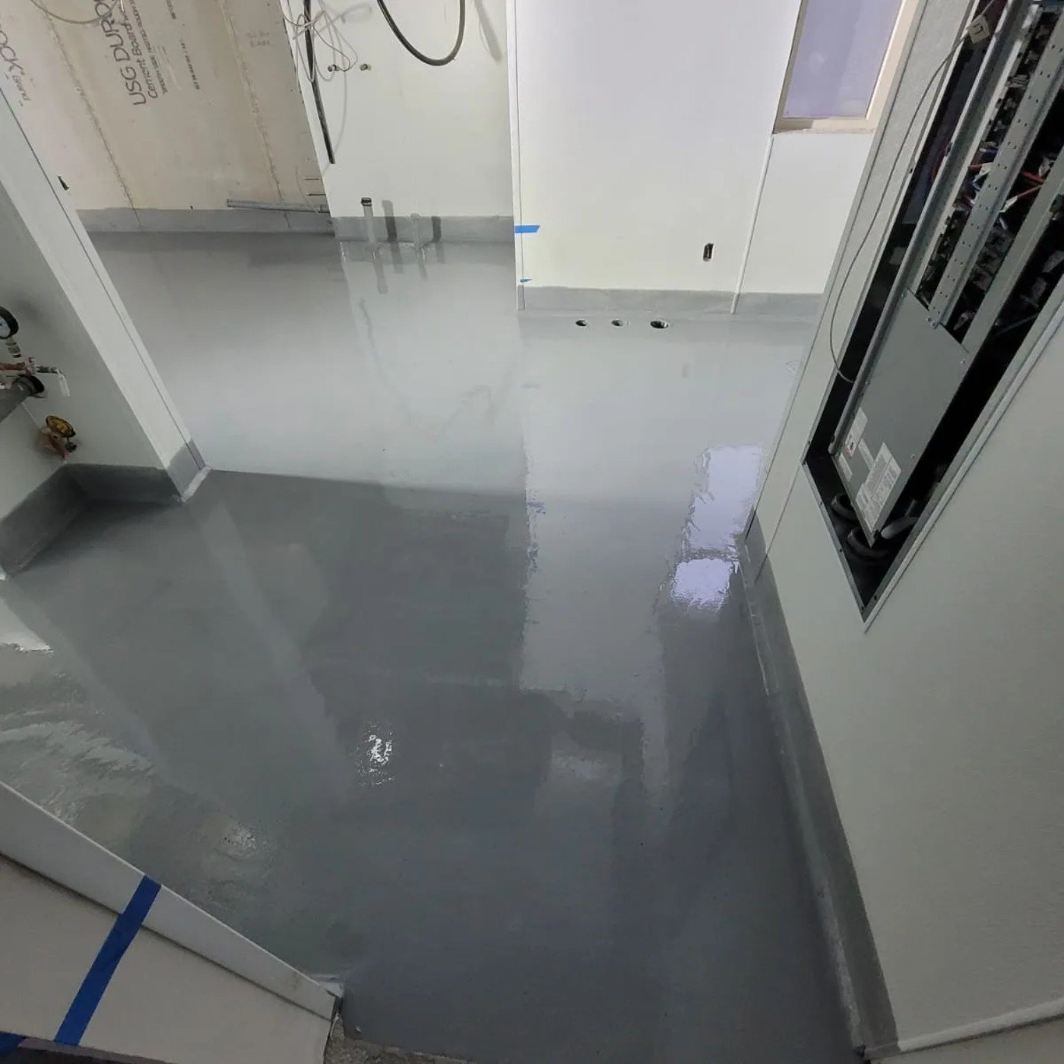 Finished restaurant resin floor and perimeter cove detail in Whistler