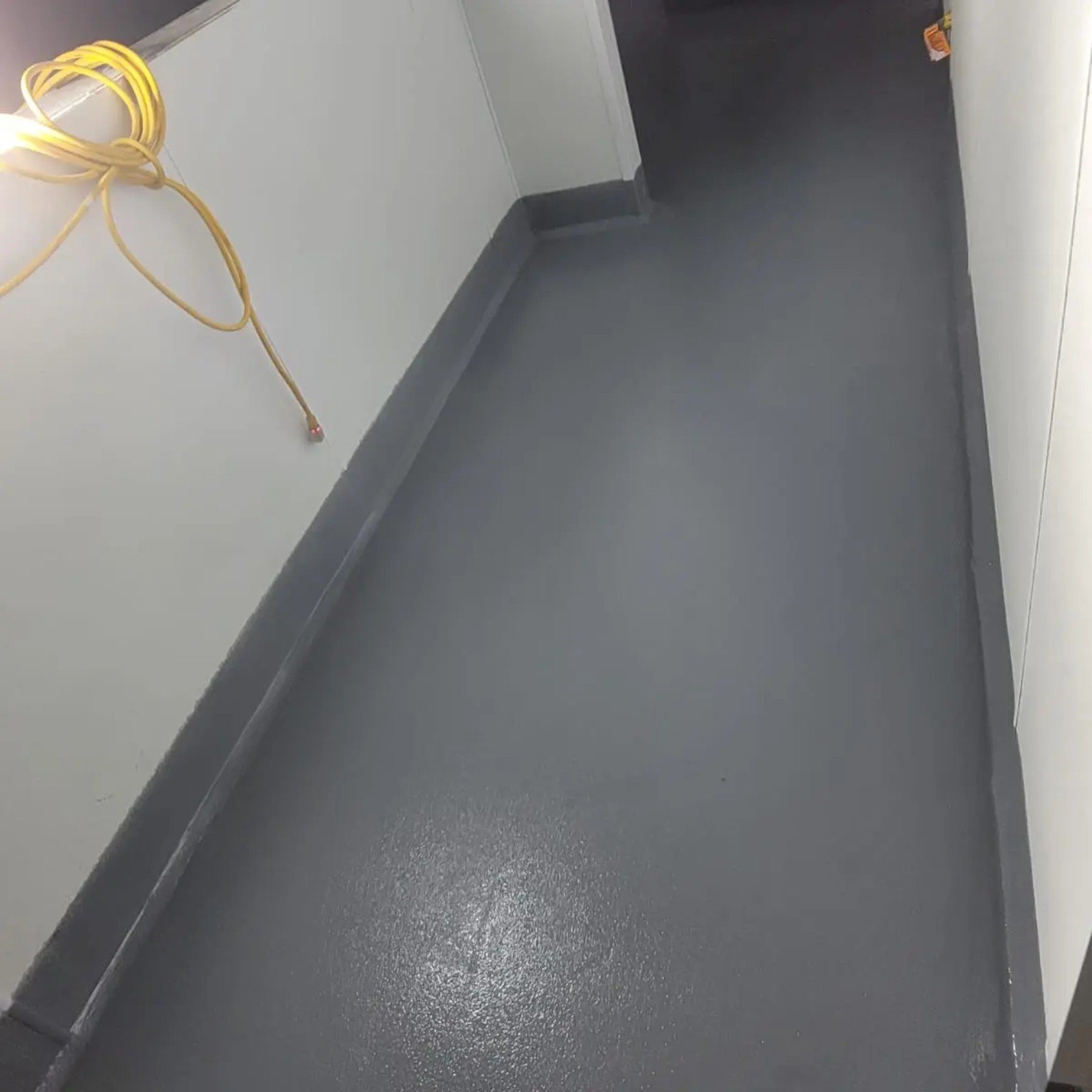 Corridor flooring completed by Priority One at Mekong Restaurant in Whistler BC