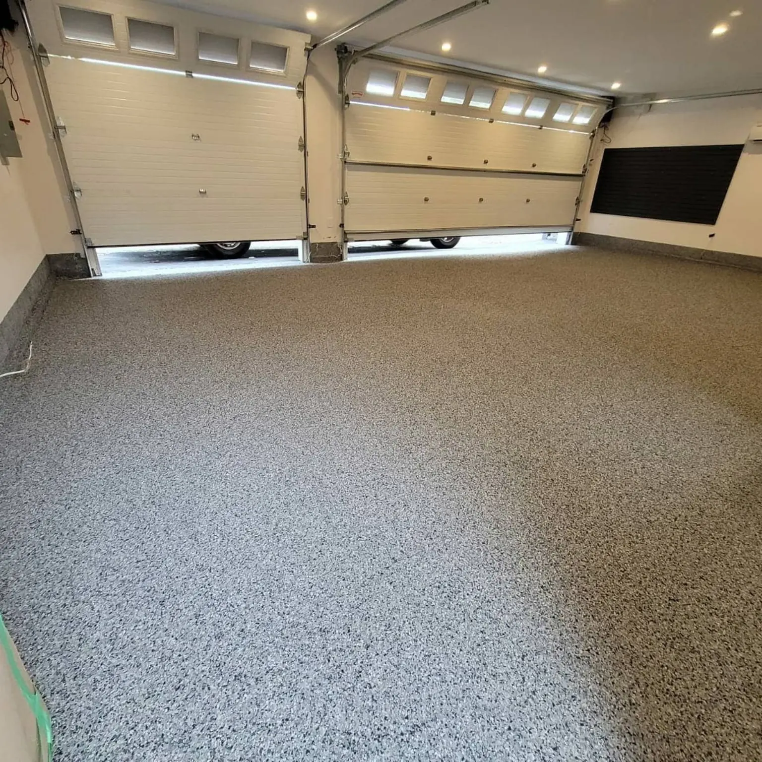 Completed full-flake epoxy garage flooring project in Vancouver BC