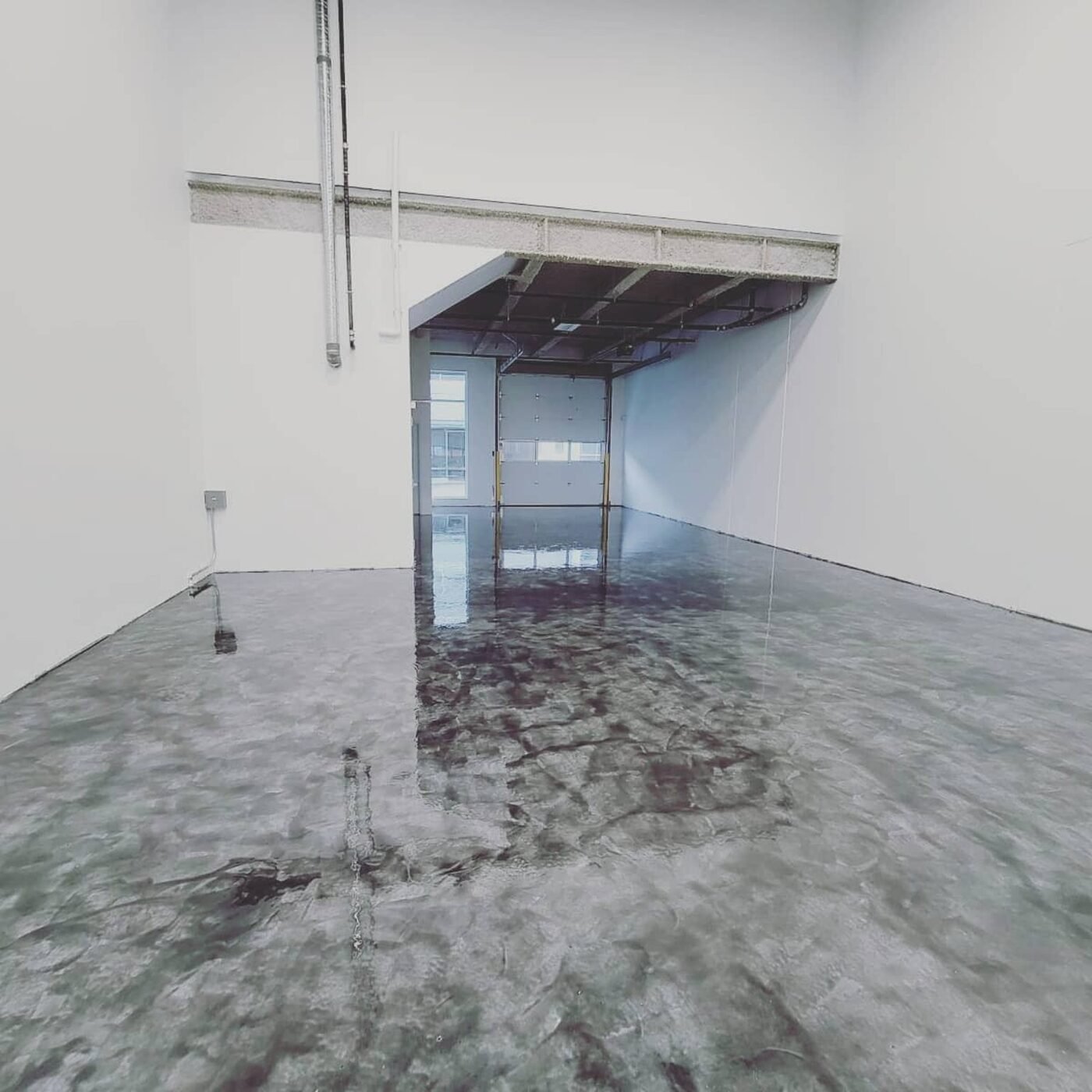Completed decorative grey commercial resin floor in Burnaby BC