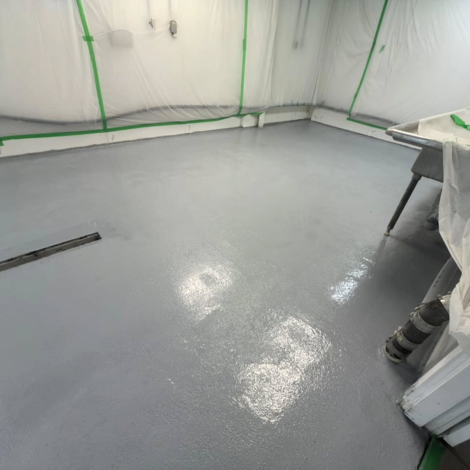 Completed grey commercial resin floor in Richmond BC