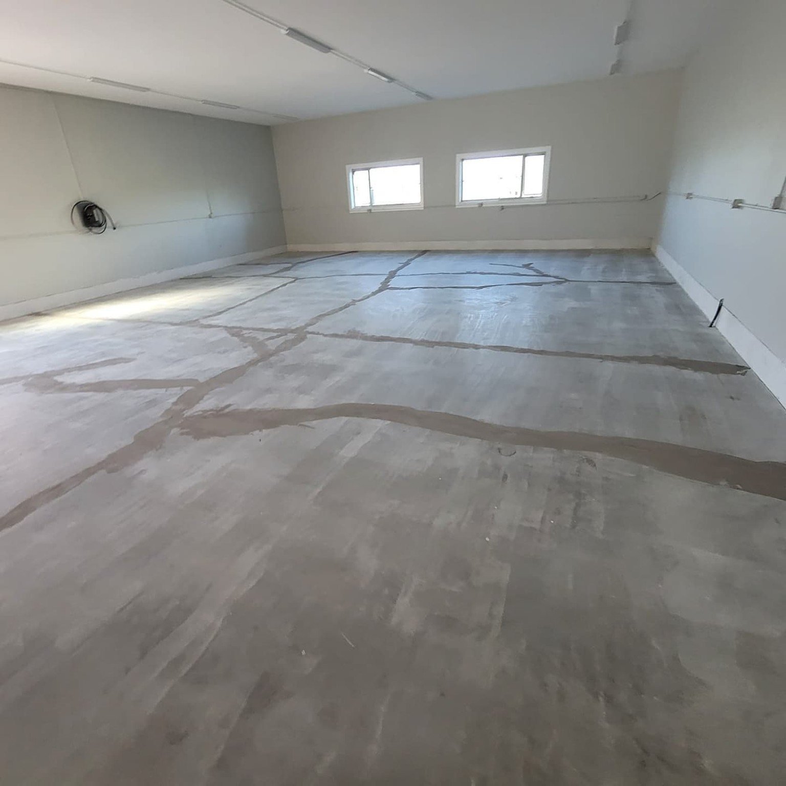 Concrete crack repairs completed before floor coating in Richmond BC