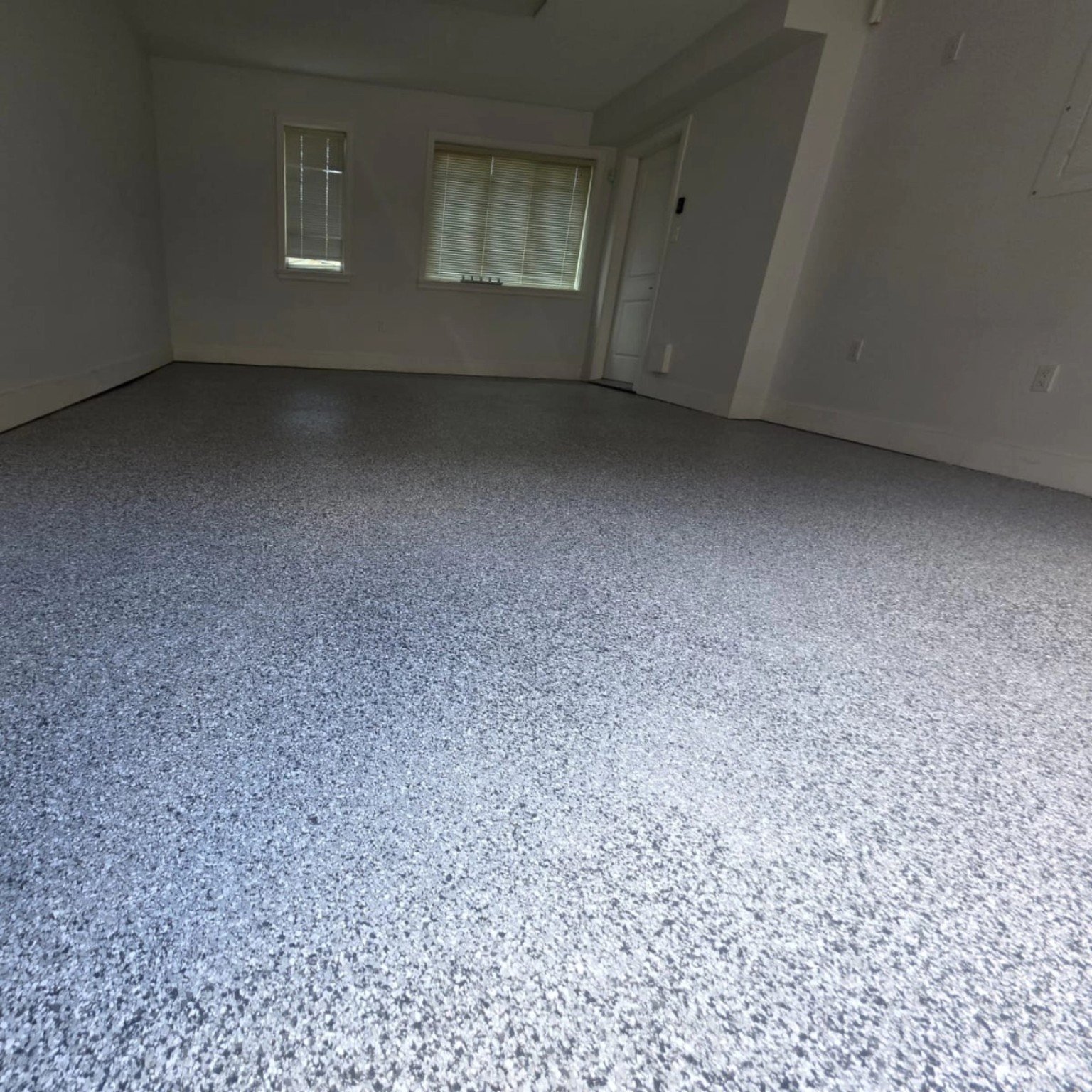 Completed full-flake garage floor coating in Richmond BC