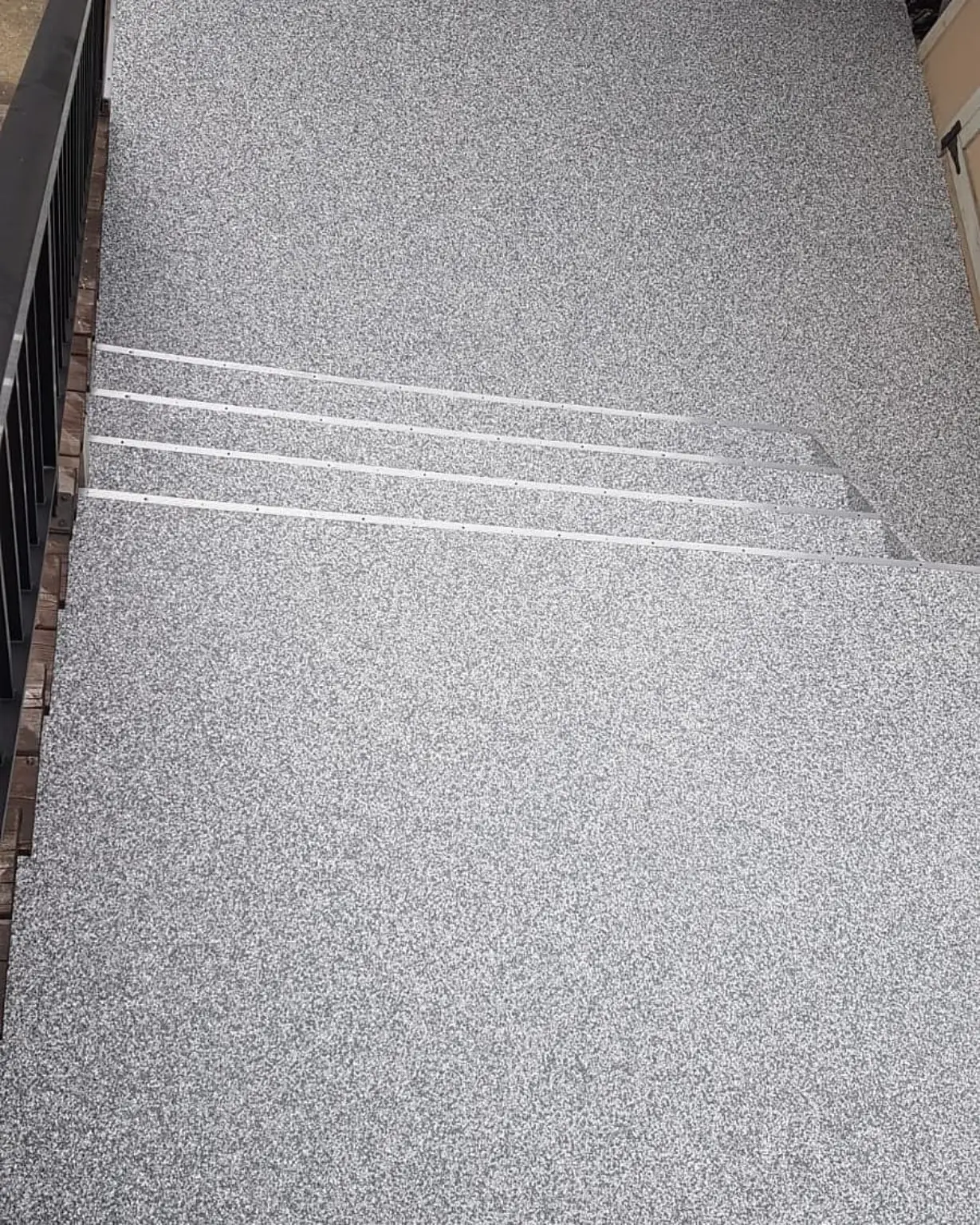 Decorative flake resin landing completed in Kitsilano, Vancouver