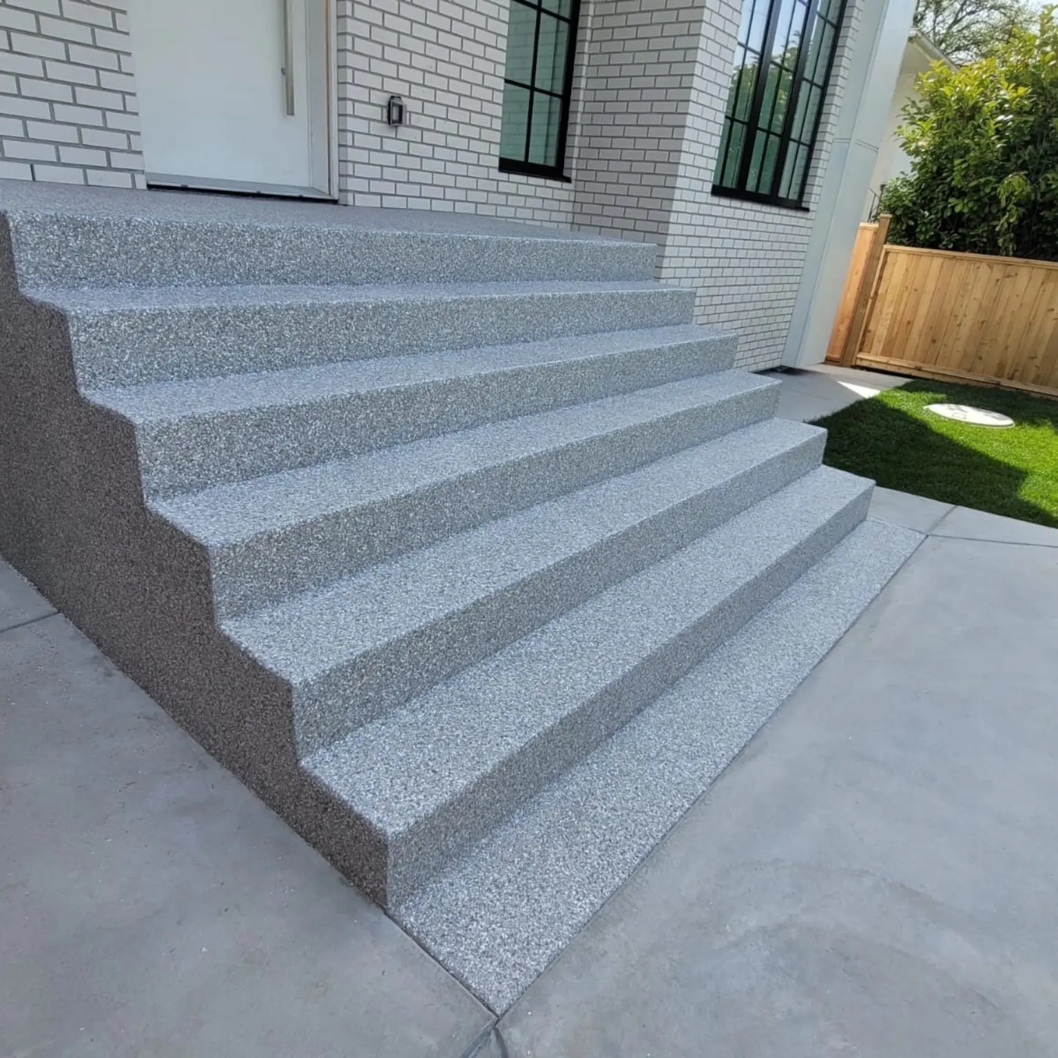 Completed decorative flake epoxy front steps in Kitsilano