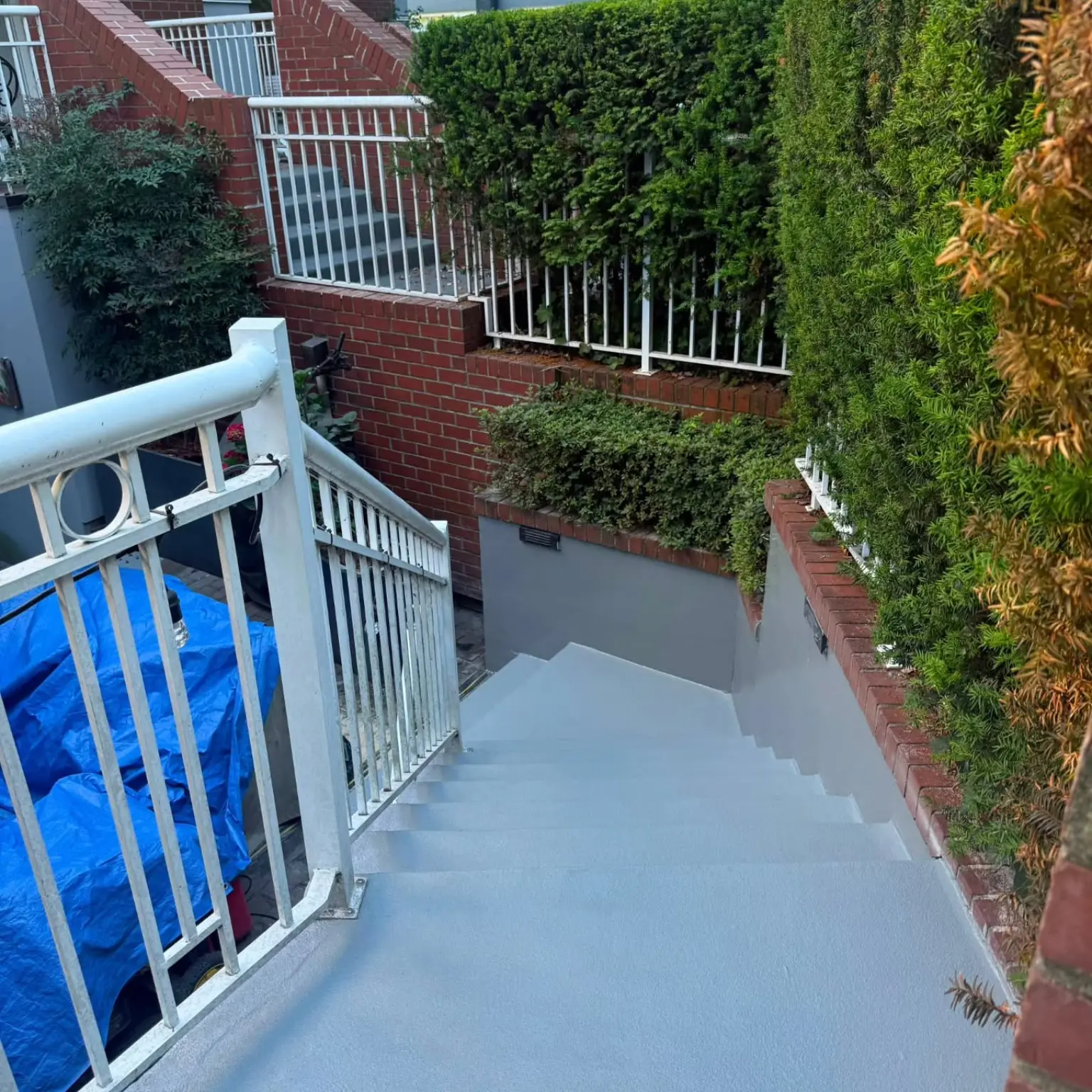 Completed solid-colour coating on Mount Pleasant exterior stairs