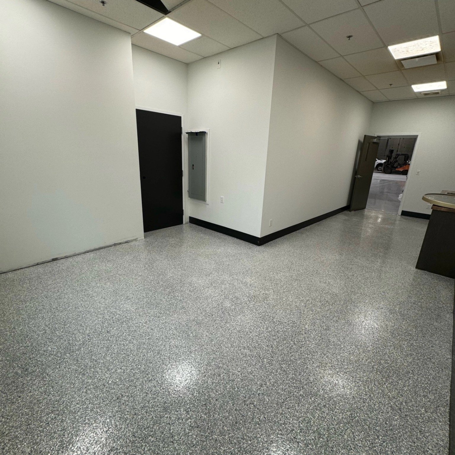 Flake resin flooring in support area at Liebherr Abbotsford project