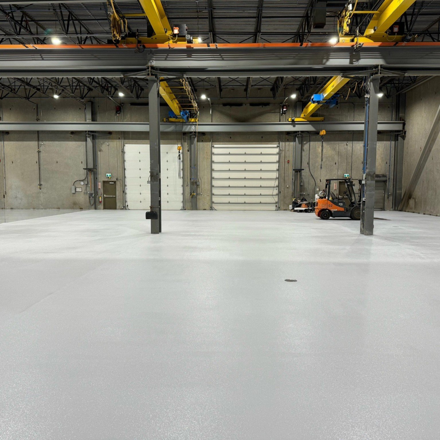 Liebherr industrial epoxy warehouse flooring project in Abbotsford BC
