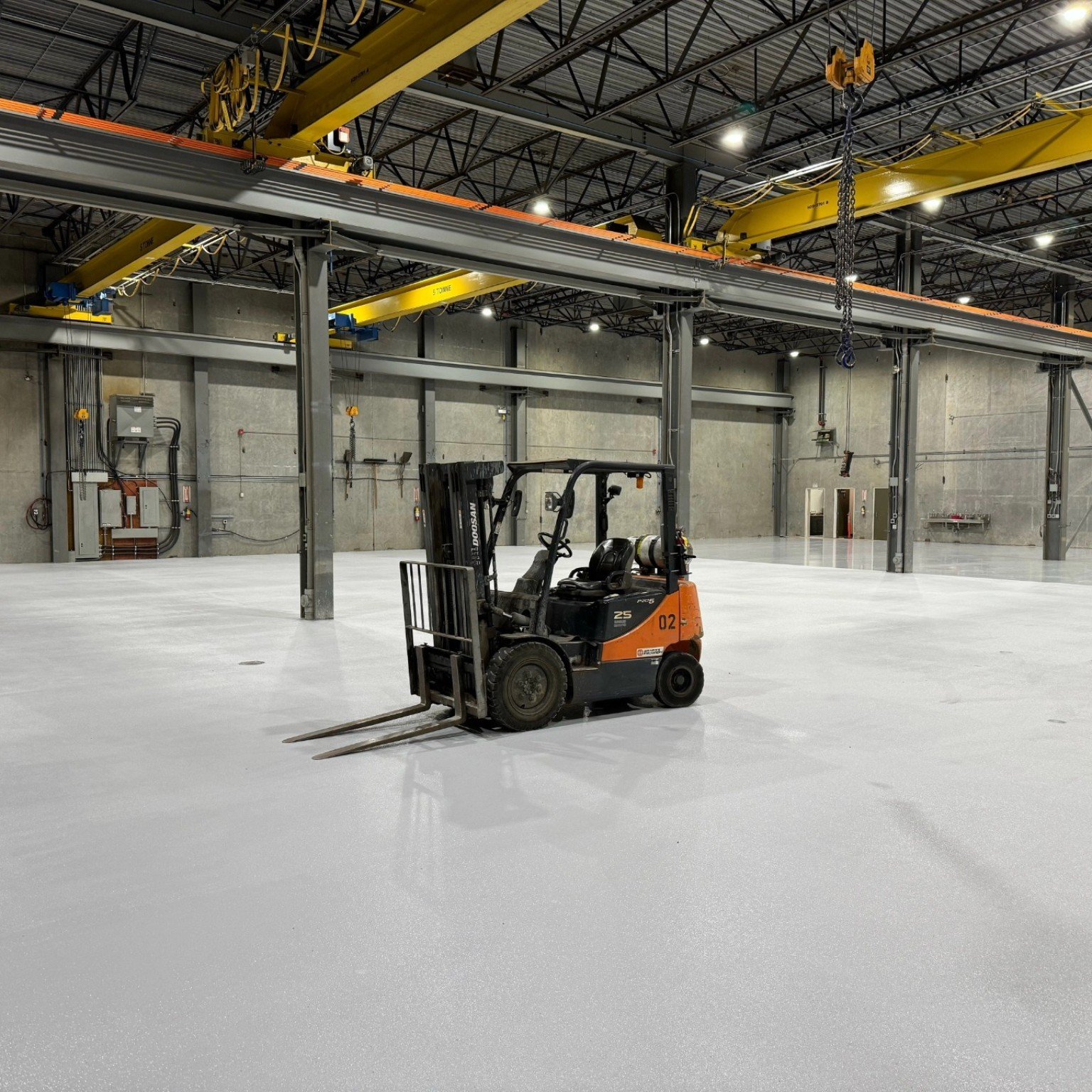 Forklift on completed Liebherr industrial flooring in Abbotsford BC
