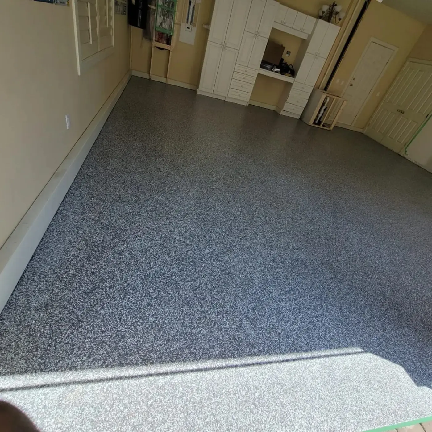 Completed full-flake epoxy garage floor coating in West Vancouver BC